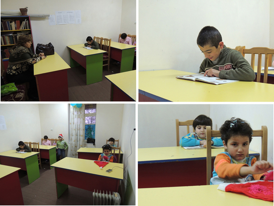 Педагог Камелла Агаджанян помогает детям делать домашнее задание Педагог Камелла Агаджанян помогает детям делать домашнее задание