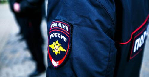 Сотрудник полиции. Фото: Максим Тишин / Югополис Сотрудник полиции. Фото: Максим Тишин / Югополис