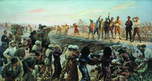 "Расстрел 26 бакинских комиссаров", 1925 год.
Худ. И. И. Бродский. 
На картине изображено, как М. Азизбеков (третий справа) подставляет под пули свою обнажённую грудь.