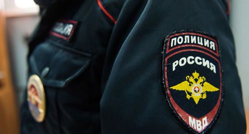 Сотрудник полиции. © Фото Елены Синеок, Юга.ру