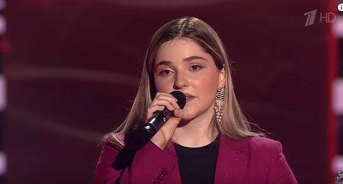 Рагда Ханиева. Стоп-кадр видео канала YouTube 
Голос / The Voice Russia https://www.youtube.com/watch?v=B5BVyY6glCQ
